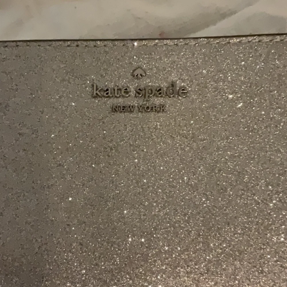 Kate Spade Glimmer Glitter Bifold Wallet, Silver, 5.5”x3.5”x1” - Picture 9 of 12